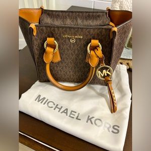 Michael Kors signature satchel bag.